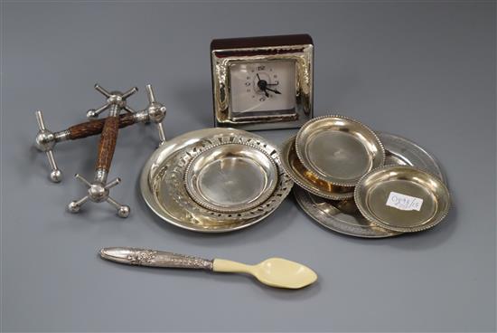 A set of six Italian 800 white meat small dishes, three other dishes, a pair of knife rests and a white metal mounted timepiece.
